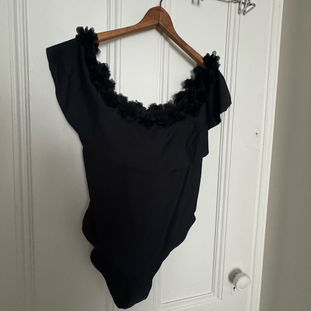 Elegant Black Women's swimsuit with cute floral trim around shoulders